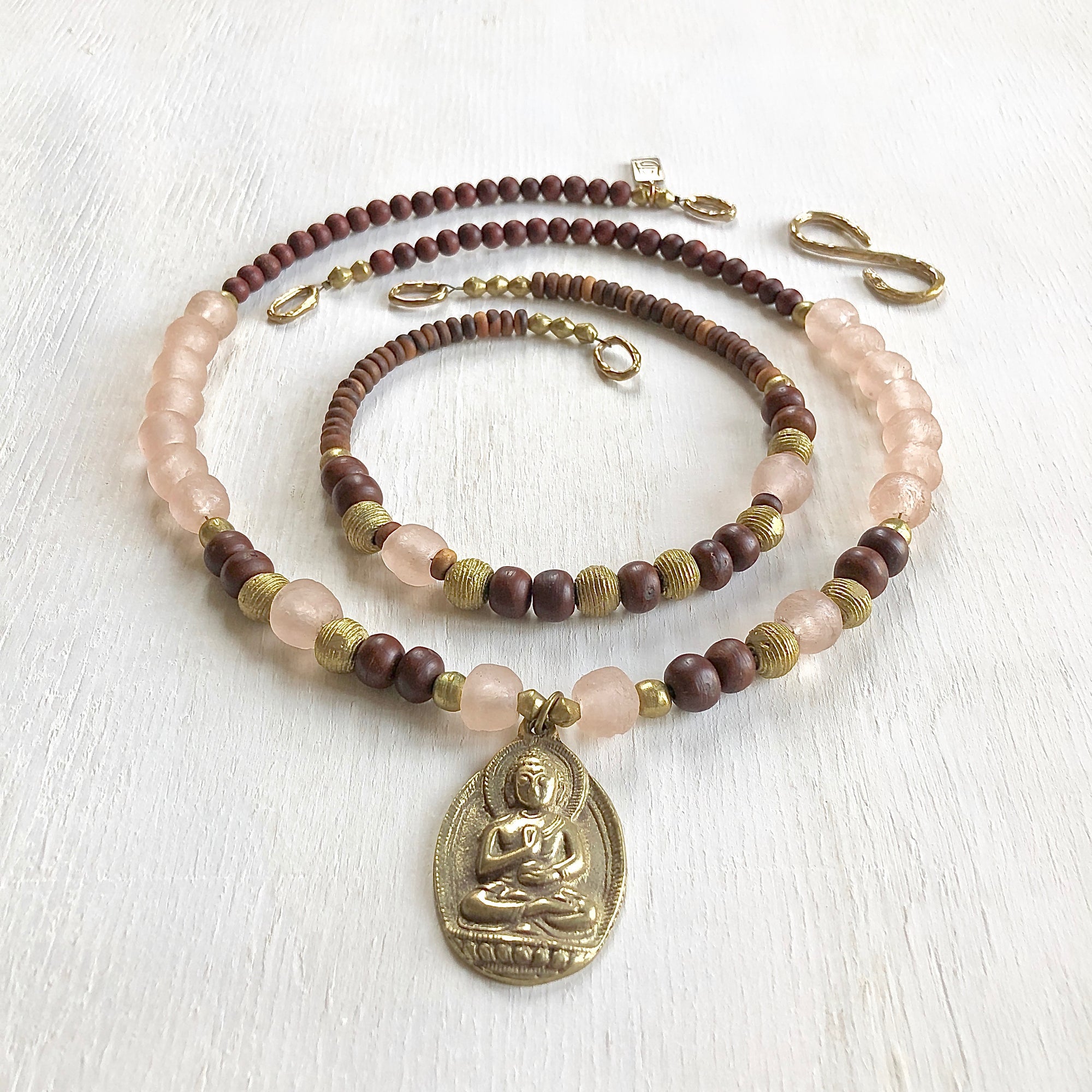 African recycled bottle beads brass Buddha double necklace. Cristina Tamames Jewelry Designer