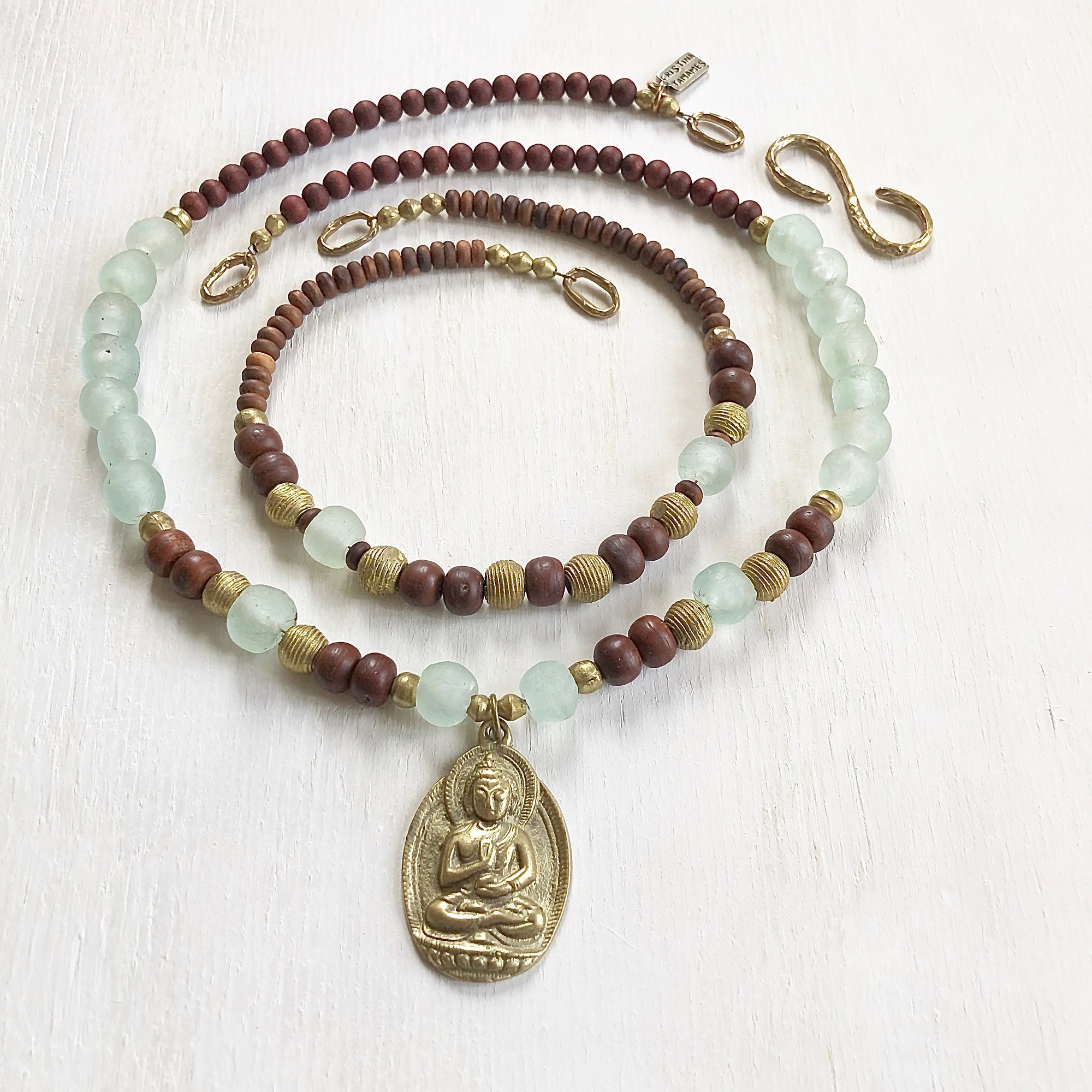 African recycled bottle beads brass Buddha double necklace. Cristina Tamames Jewelry Designer