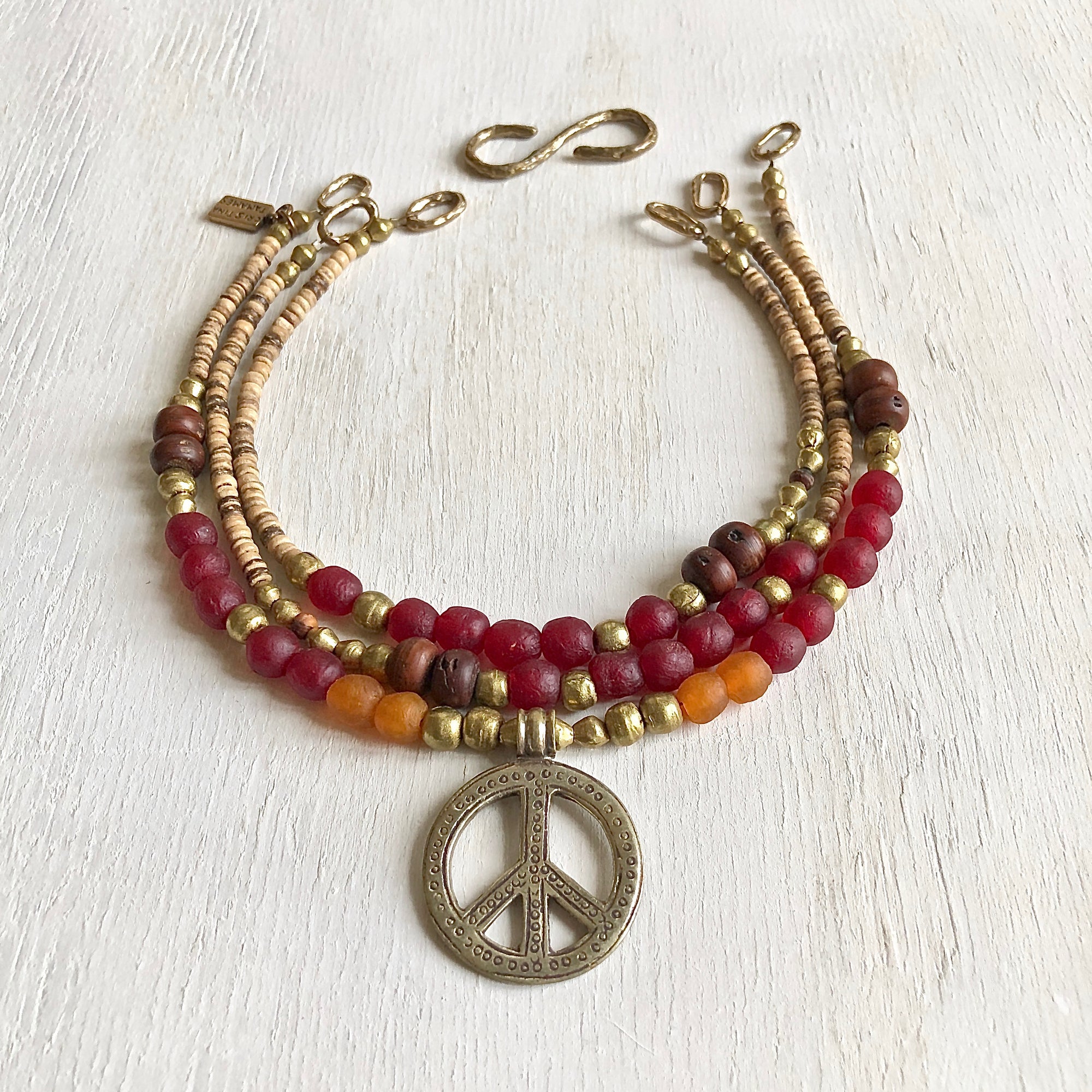African recycled bottle beads peace necklace. Cristina Tamames Jewelry Designer