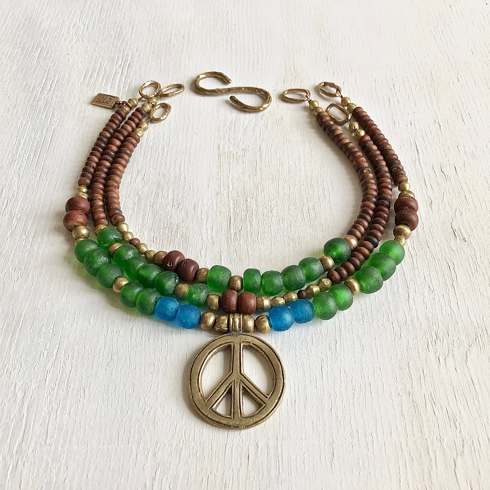 African recycled bottle beads peace necklace. Cristina Tamames Jewelry Designer