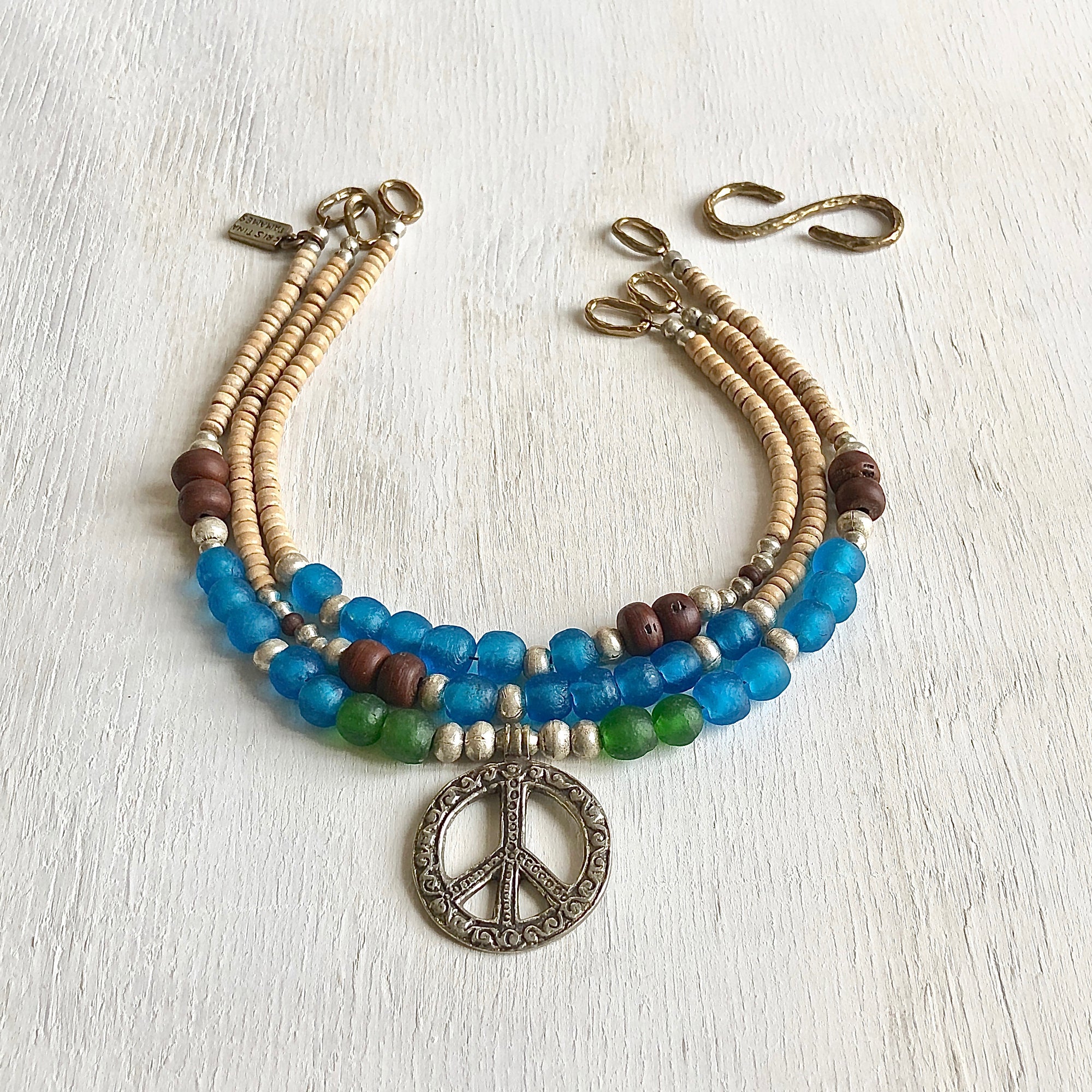 African recycled bottle beads peace necklace. Cristina Tamames Jewelry Designer