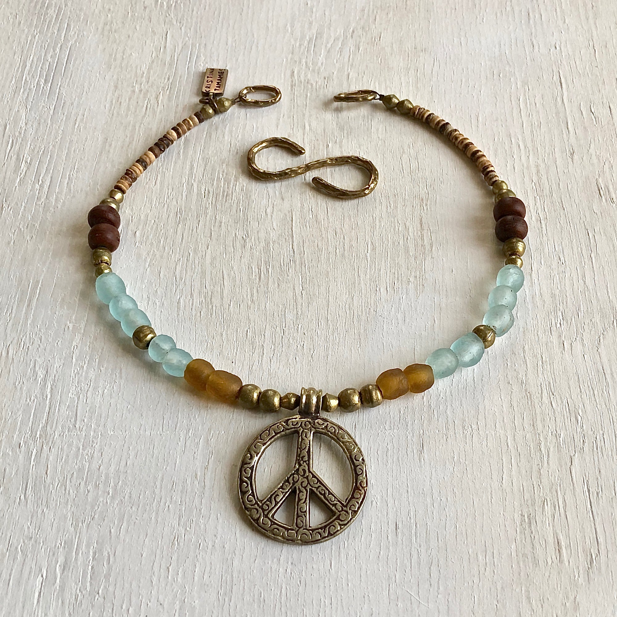 African recycled bottle beads peace necklace. Cristina Tamames Jewelry Designer