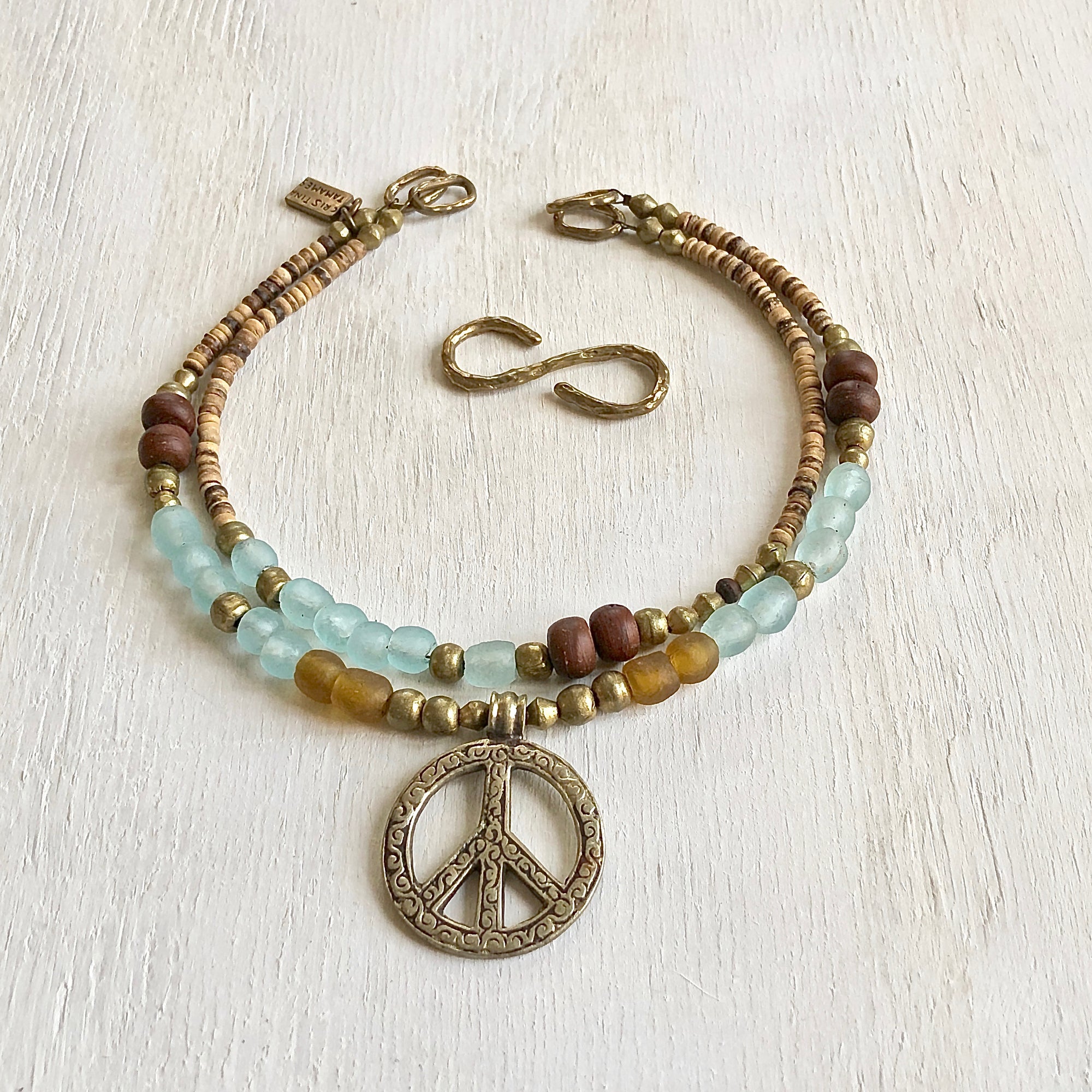 African recycled bottle beads peace necklace. Cristina Tamames Jewelry Designer