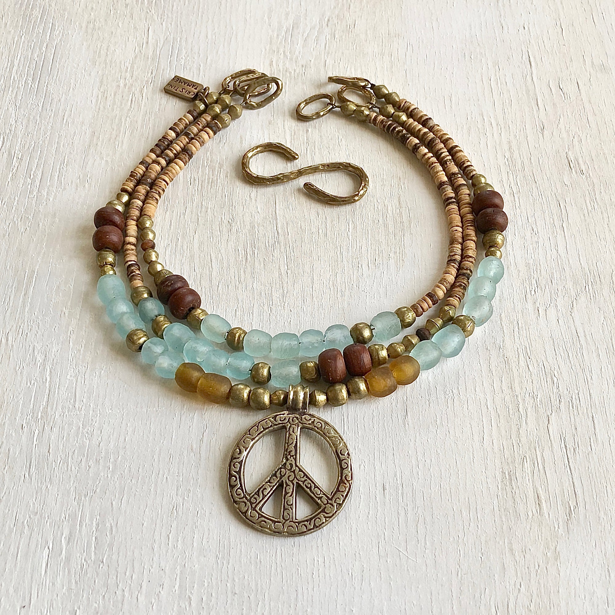 African recycled bottle beads peace necklace. Cristina Tamames Jewelry Designer