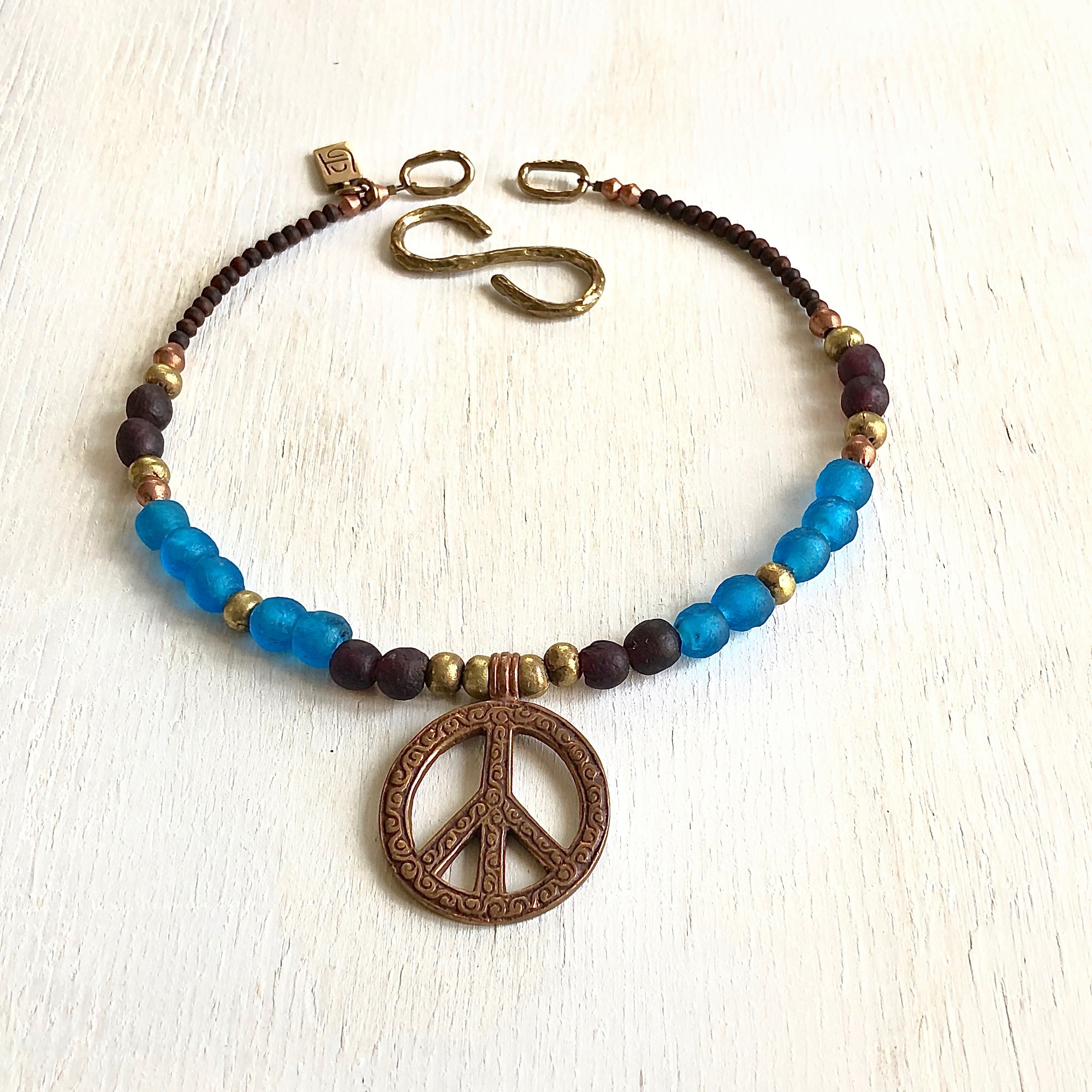 African recycled bottle beads peace necklace. Cristina Tamames Jewelry Designer