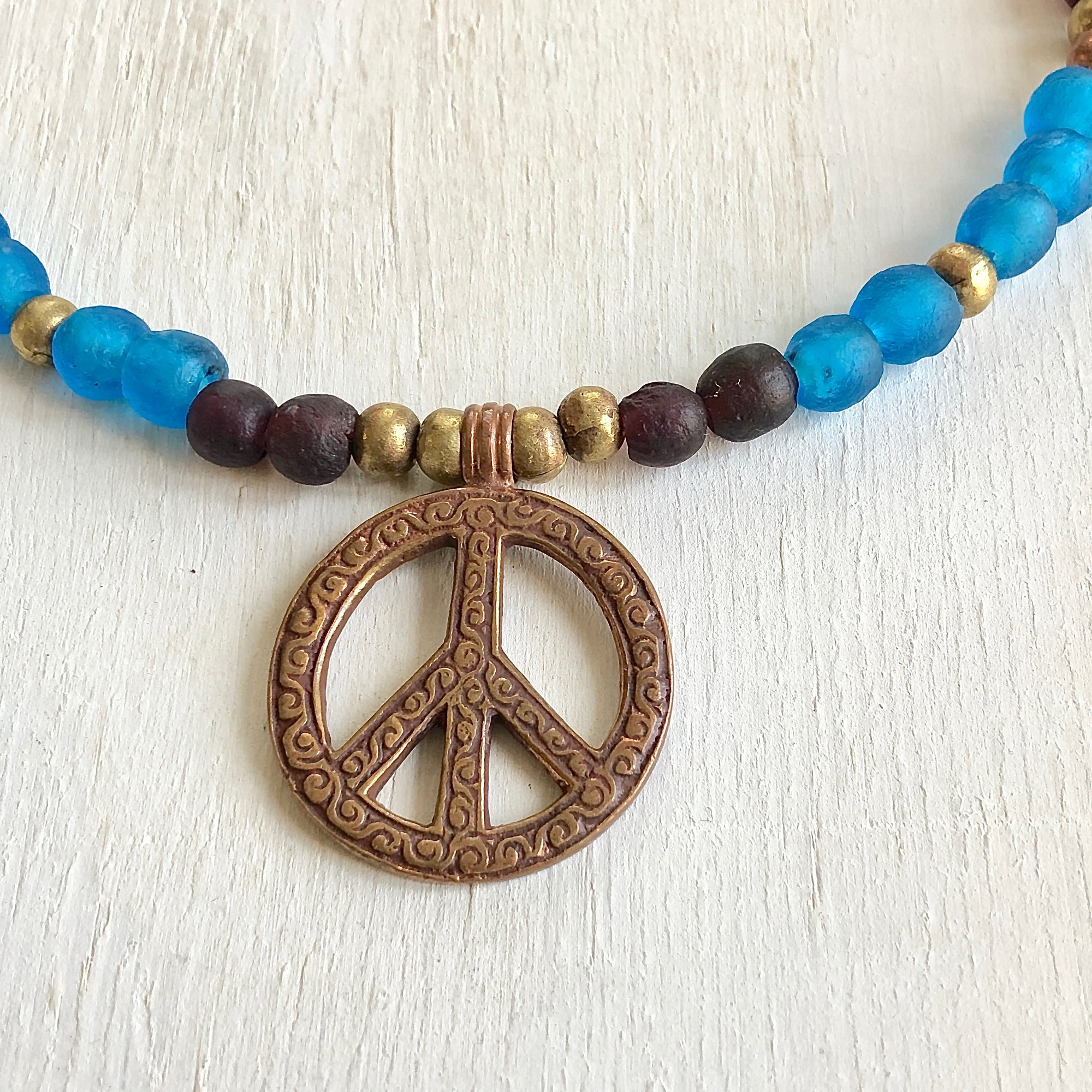 African recycled bottle beads peace necklace. Cristina Tamames Jewelry Designer