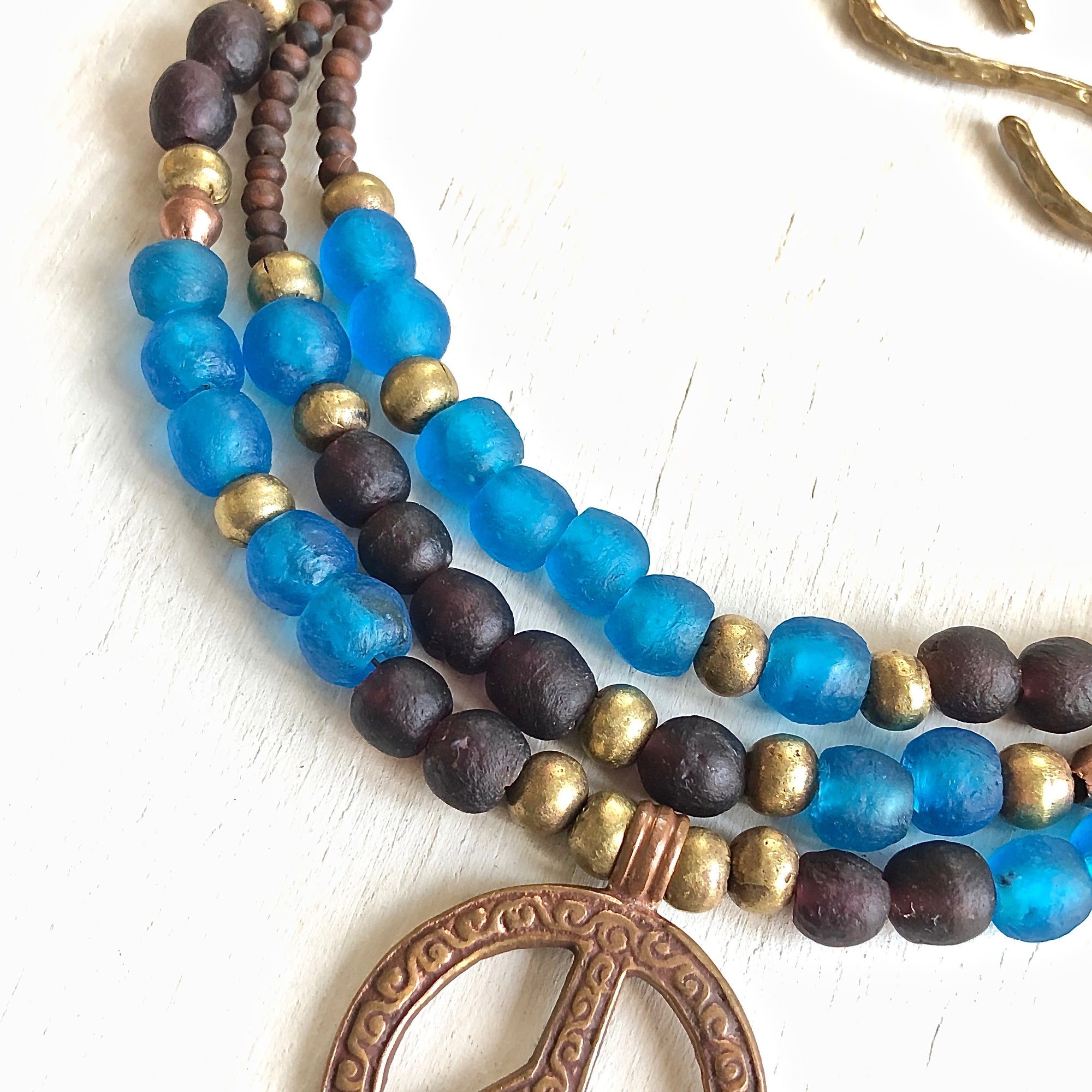 African recycled bottle beads peace necklace. Cristina Tamames Jewelry Designer