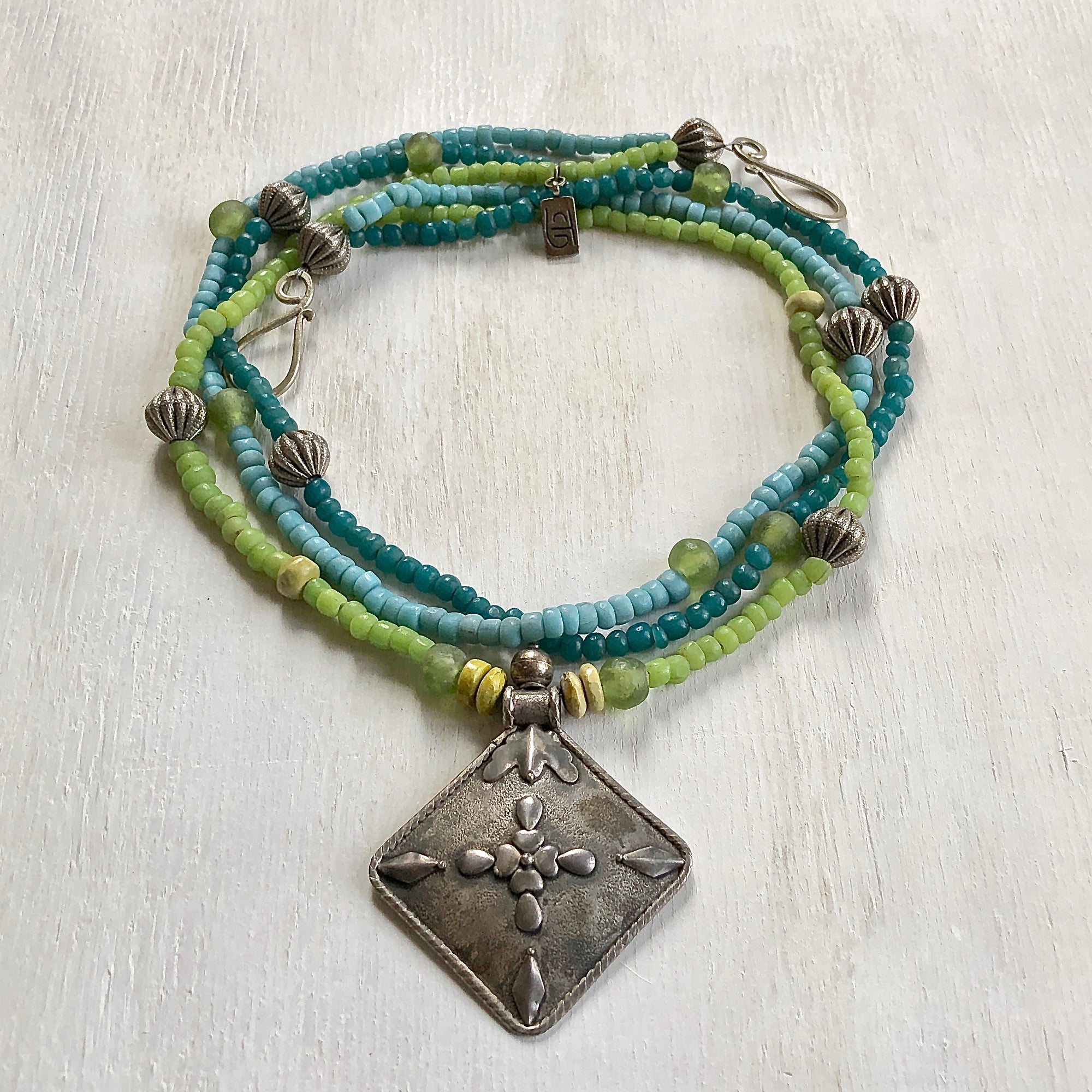 Trade blue green teal beads necklace. Cristina Tamames Jewelry Designer