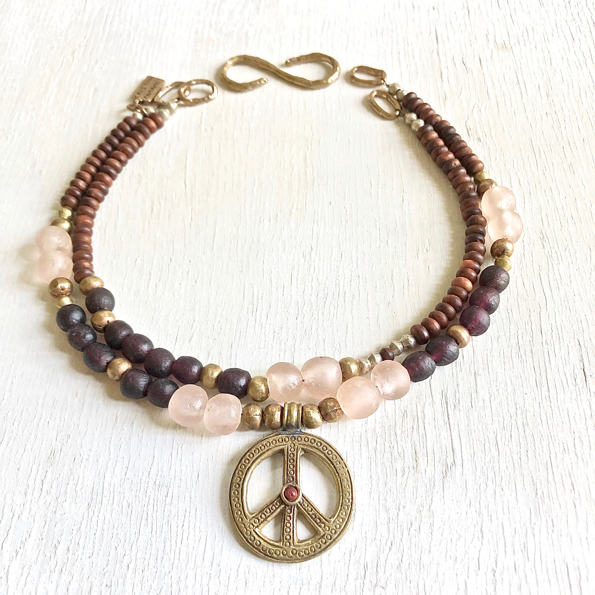African recycled bottle beads peace necklace. Cristina Tamames Jewelry Designer