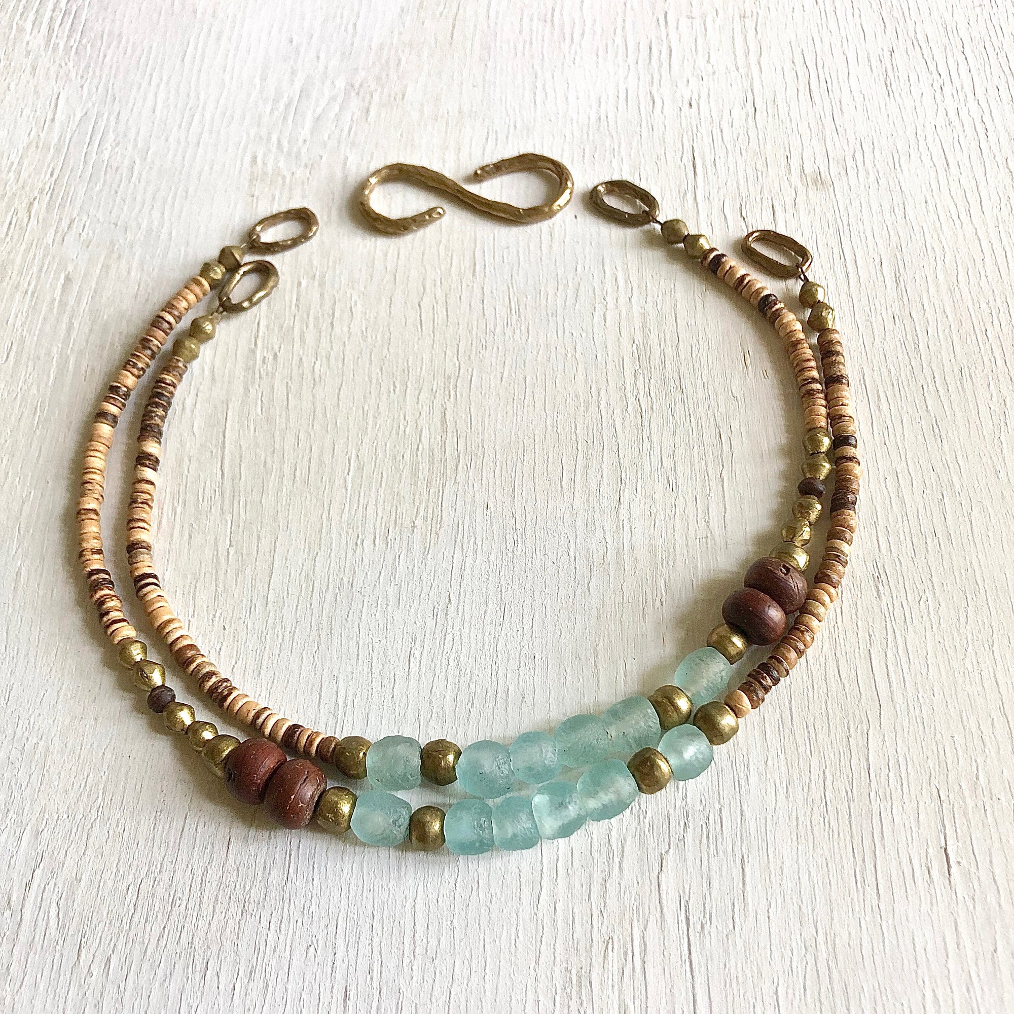 African recycled bottle beads peace necklace. Cristina Tamames Jewelry Designer