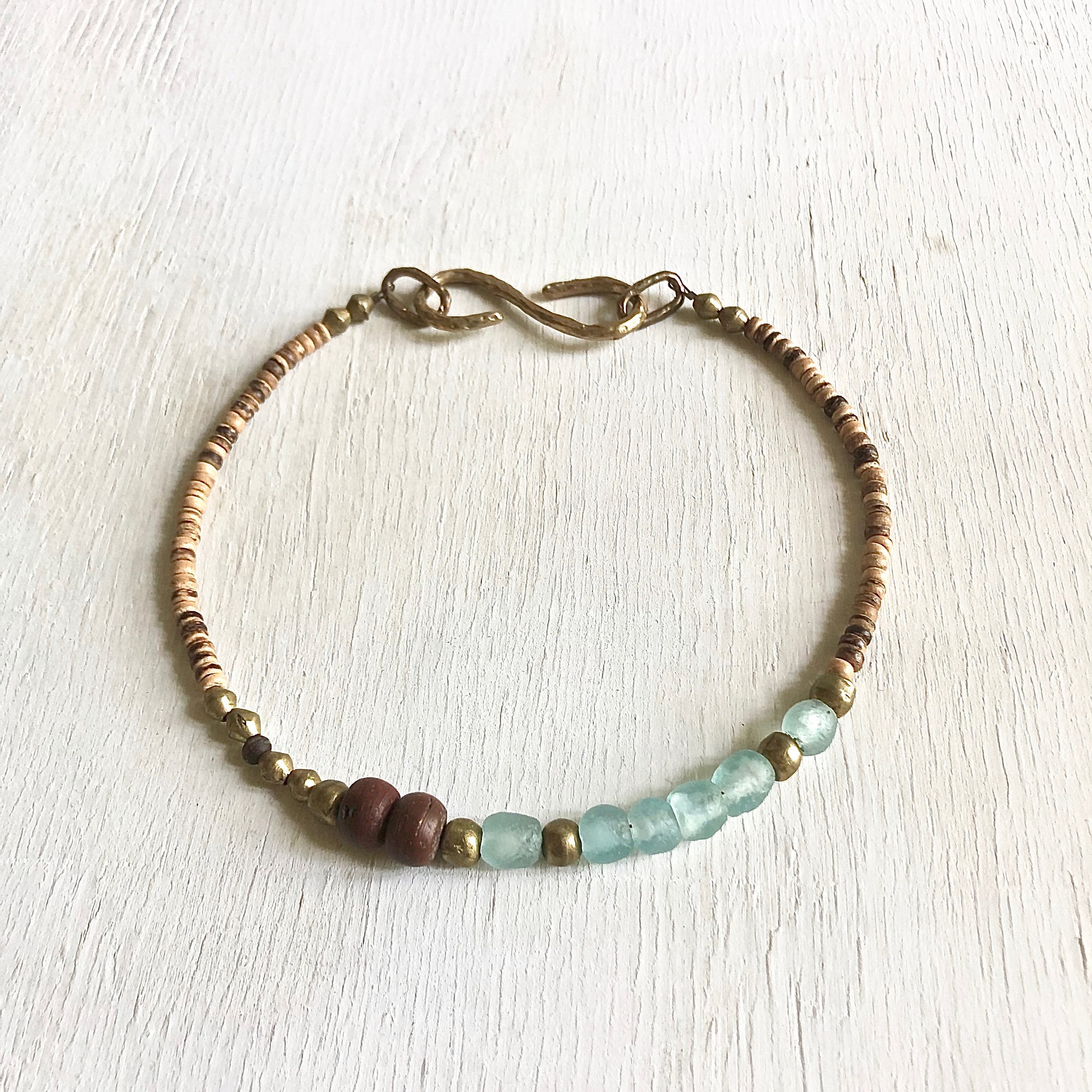 African recycled bottle beads peace necklace. Cristina Tamames Jewelry Designer