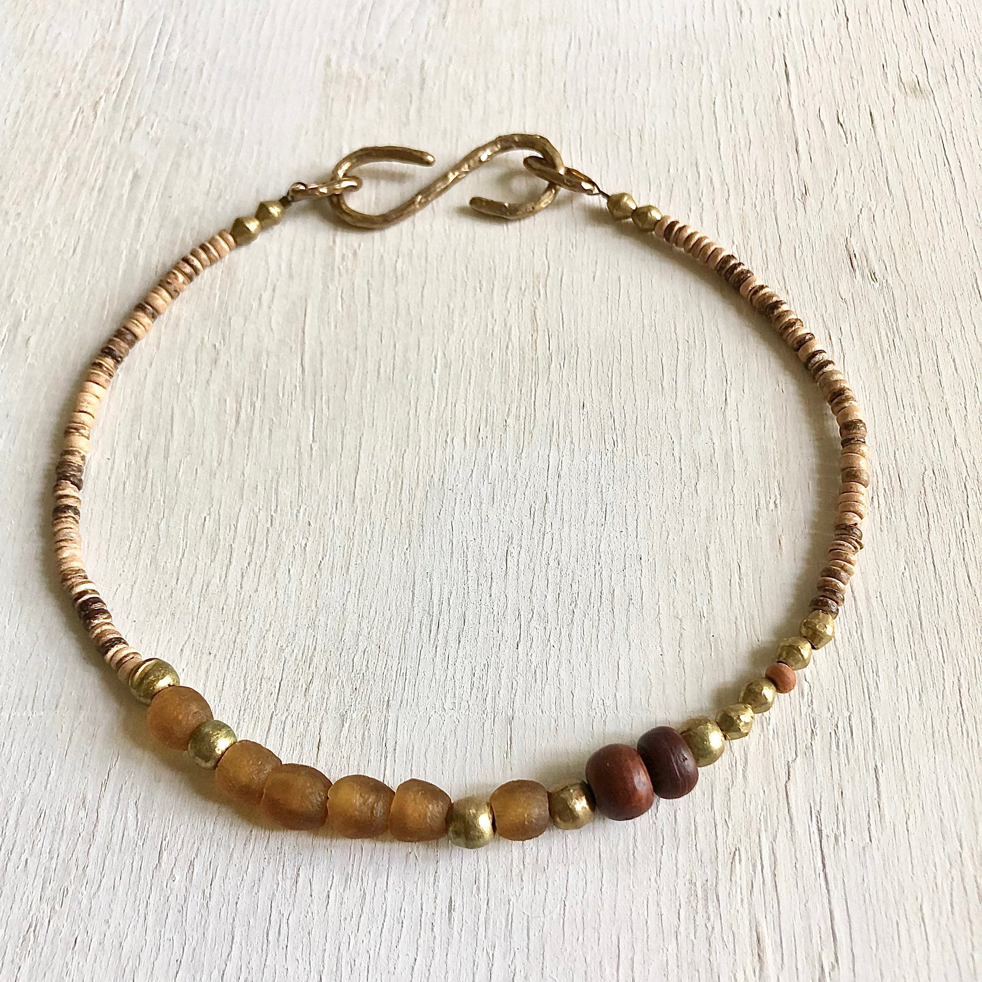 African recycled bottle beads peace necklace. Cristina Tamames Jewelry designer