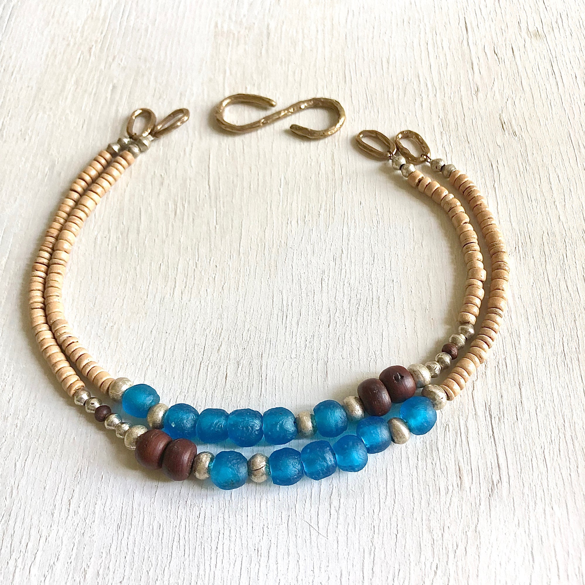 African recycled bottle beads peace necklace. Cristina Tamames Jewelry Designer