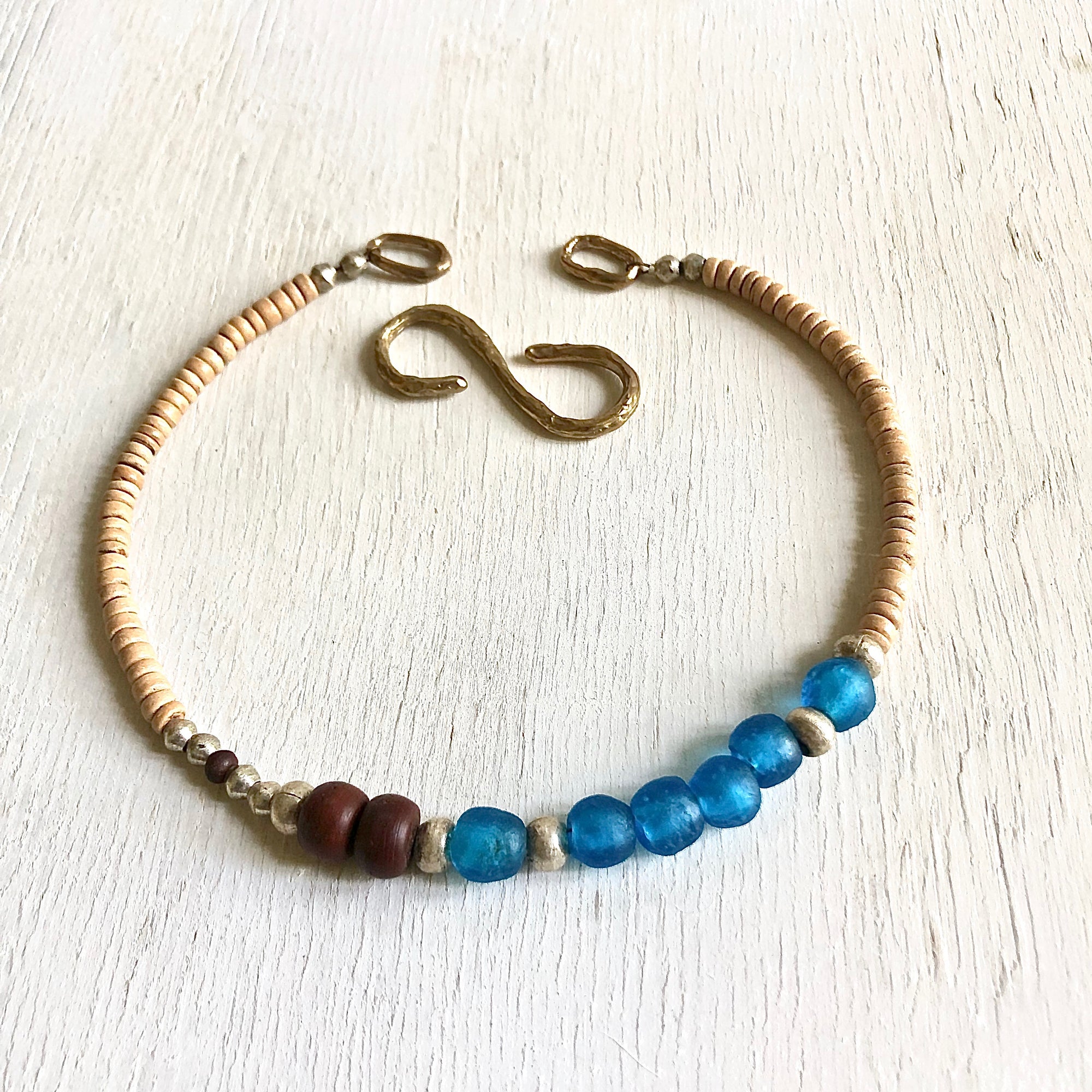 African recycled bottle beads peace necklace. Cristina Tamames Jewelry Designer