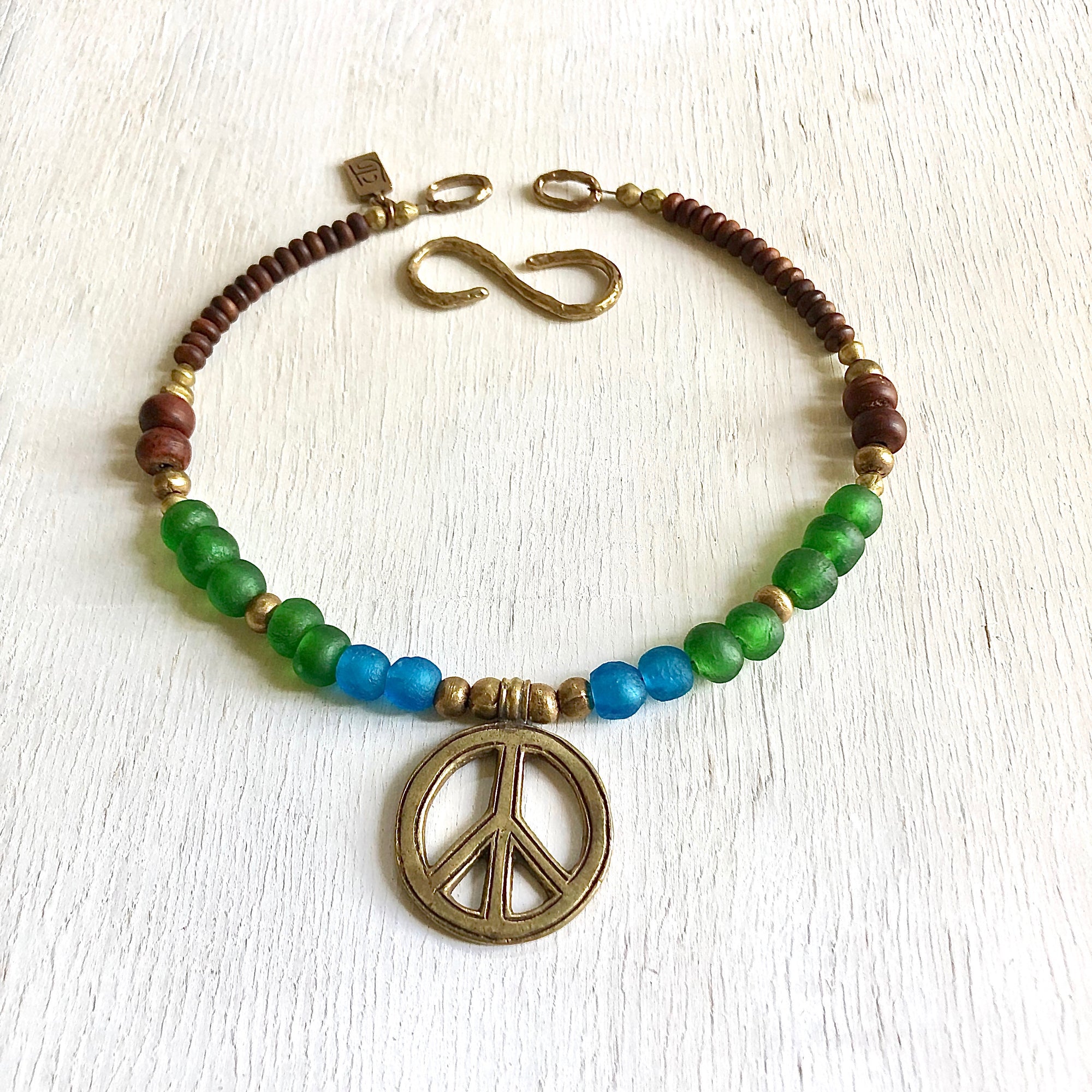 African recycled bottle beads peace necklace. Cristina Tamames Jewelry Designer