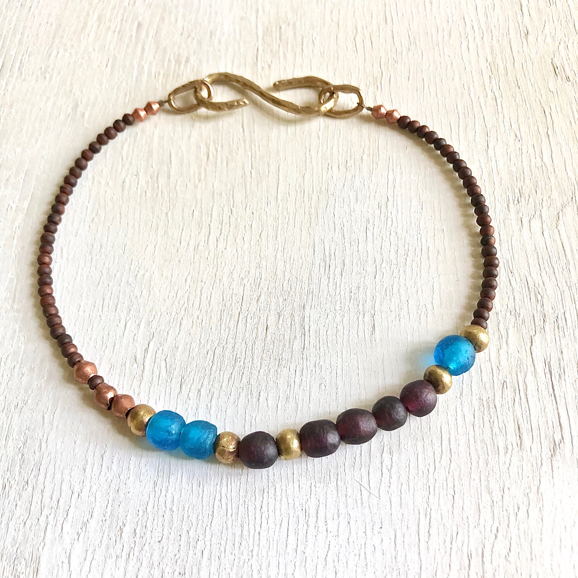 African recycled bottle beads peace necklace. Cristina Tamames Jewelry Designer