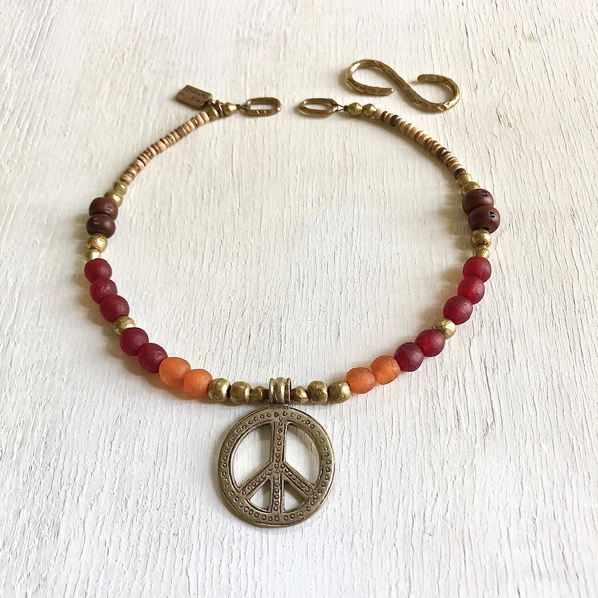 African recycled bottle beads peace necklace. Cristina Tamames Jewelry Designer
