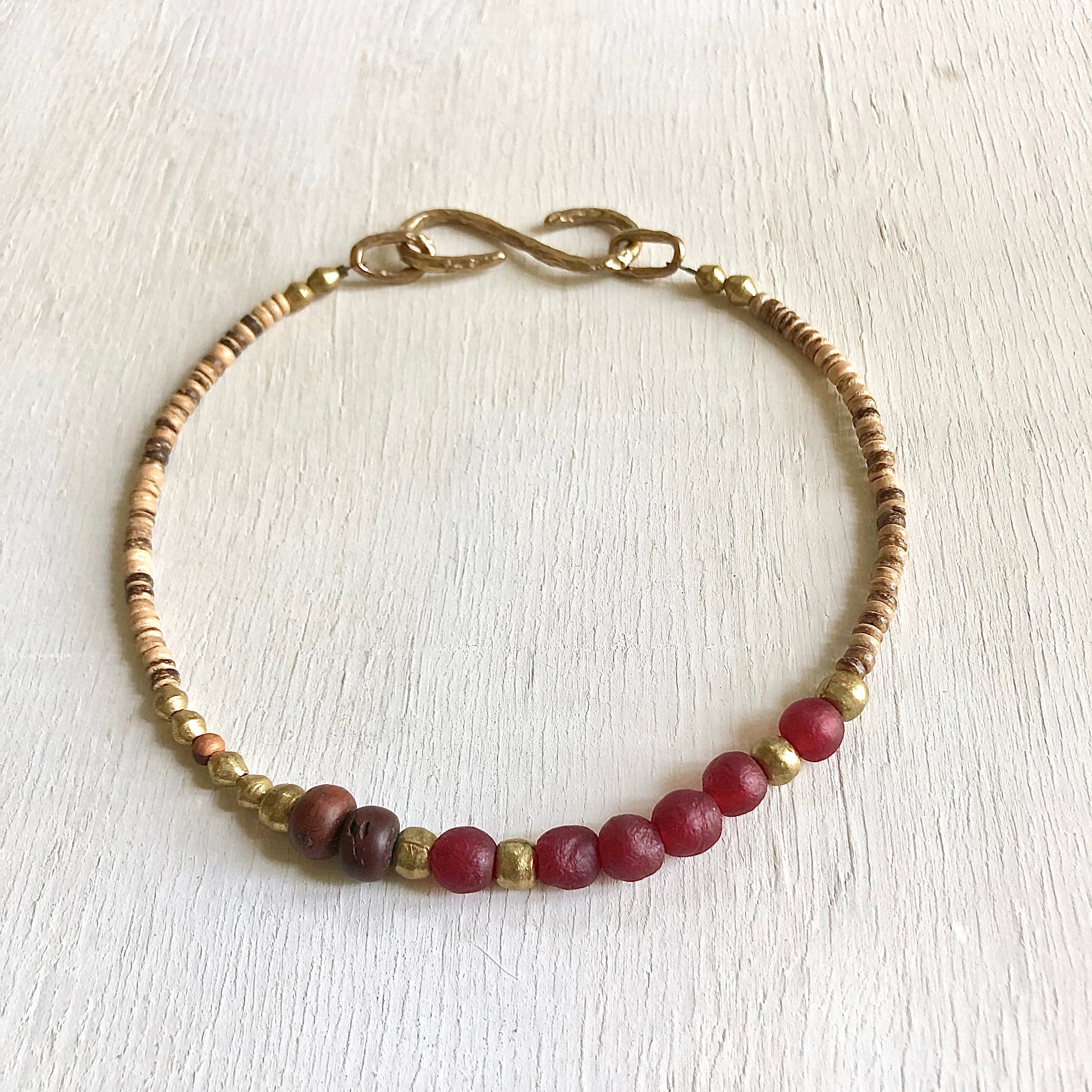 African recycled bottle beads peace necklace. Cristina Tamames Jewelry Designer