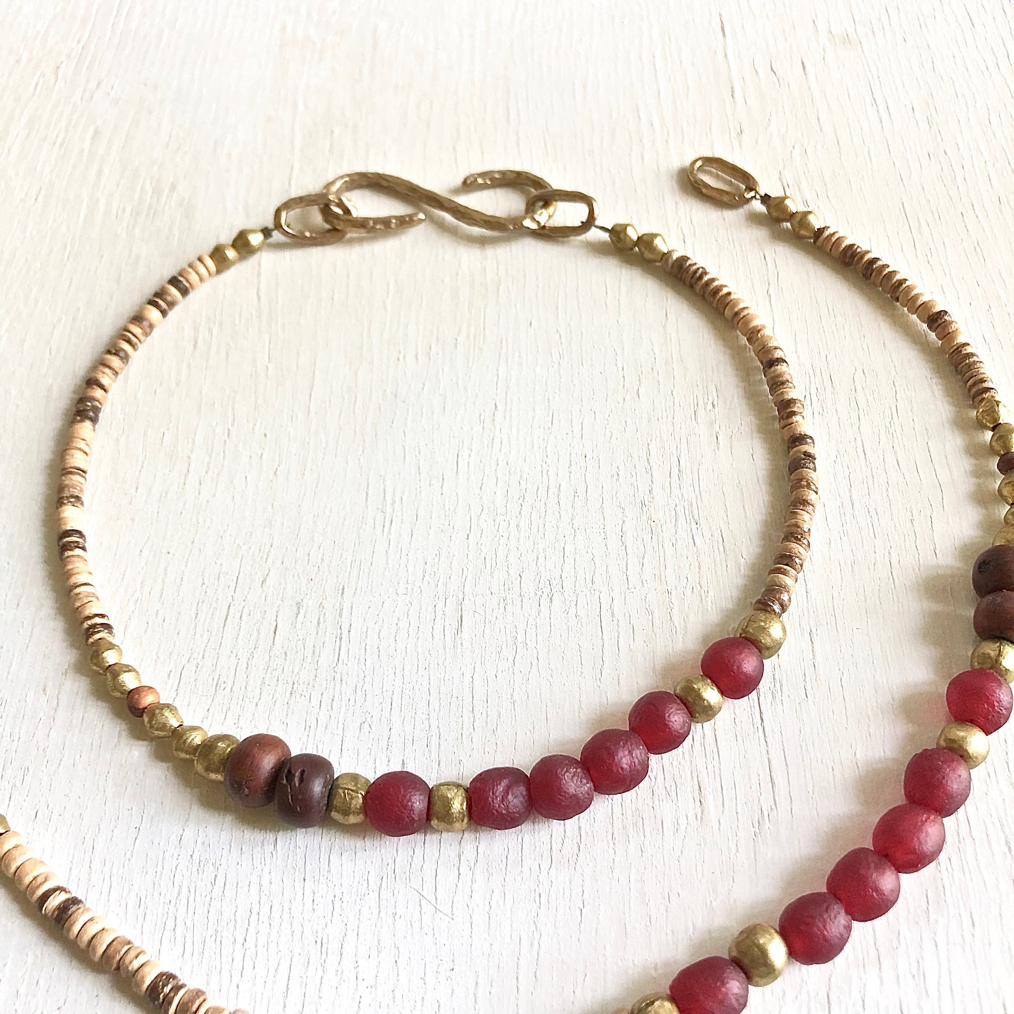 African recycled bottle beads peace necklace. Cristina Tamames Jewelry Designer
