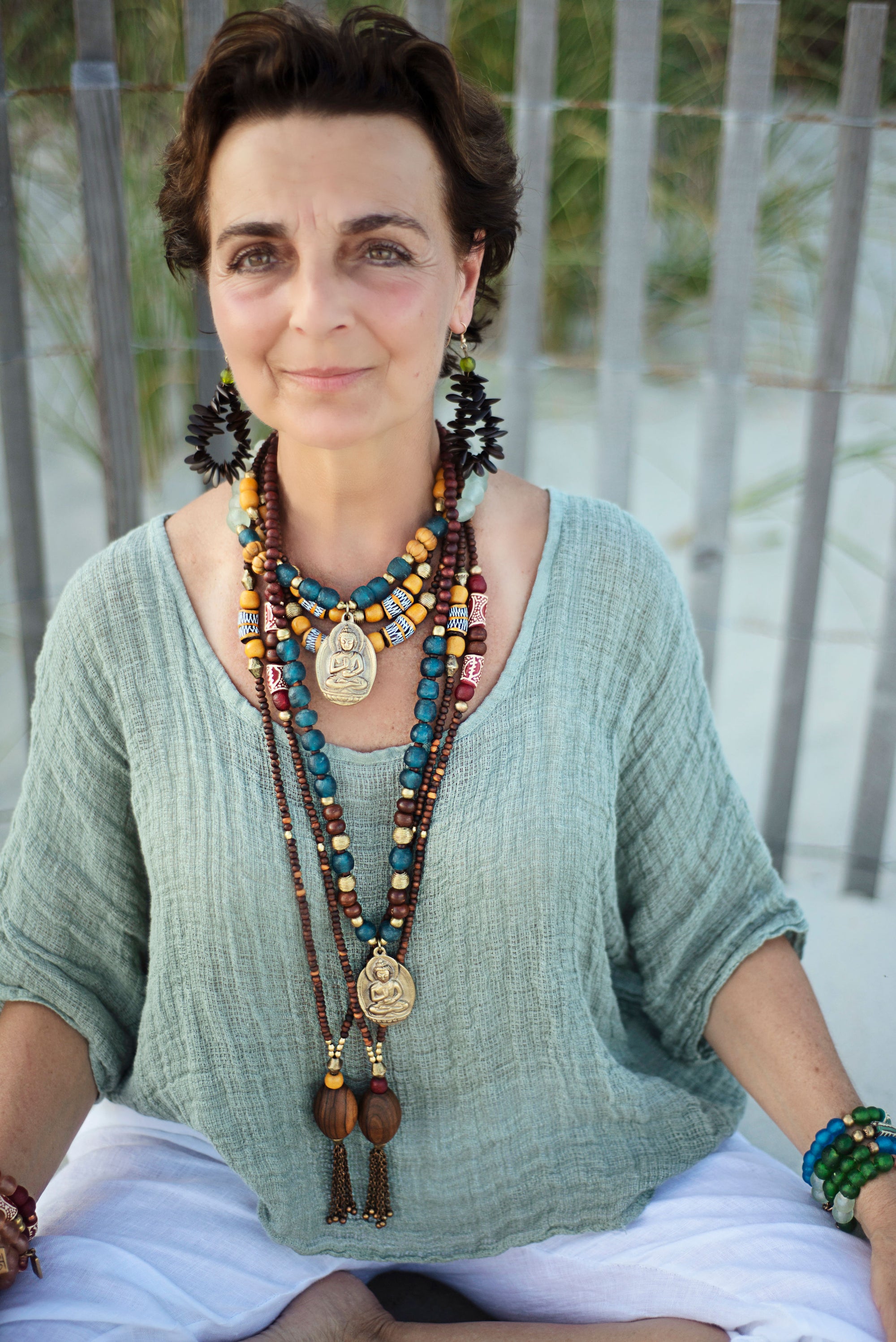 Hand painted green Adinkra African beads with vintage olive wood pendant long necklace. Cristina Tamames Jewelry Designer