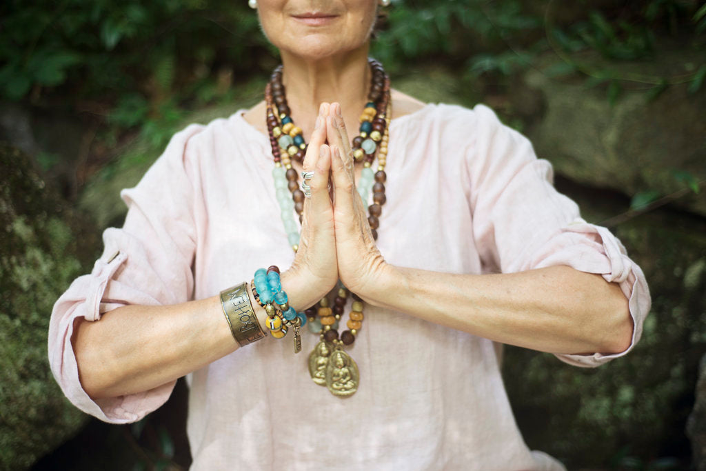 African recycled bottle beads brass Buddha double necklace. Cristina Tamames Jewelry Designer