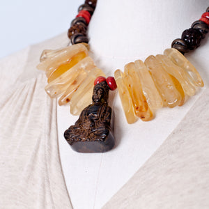 Amber coral jade Buddha necklace. Cristina Tamames Jewelry Designer