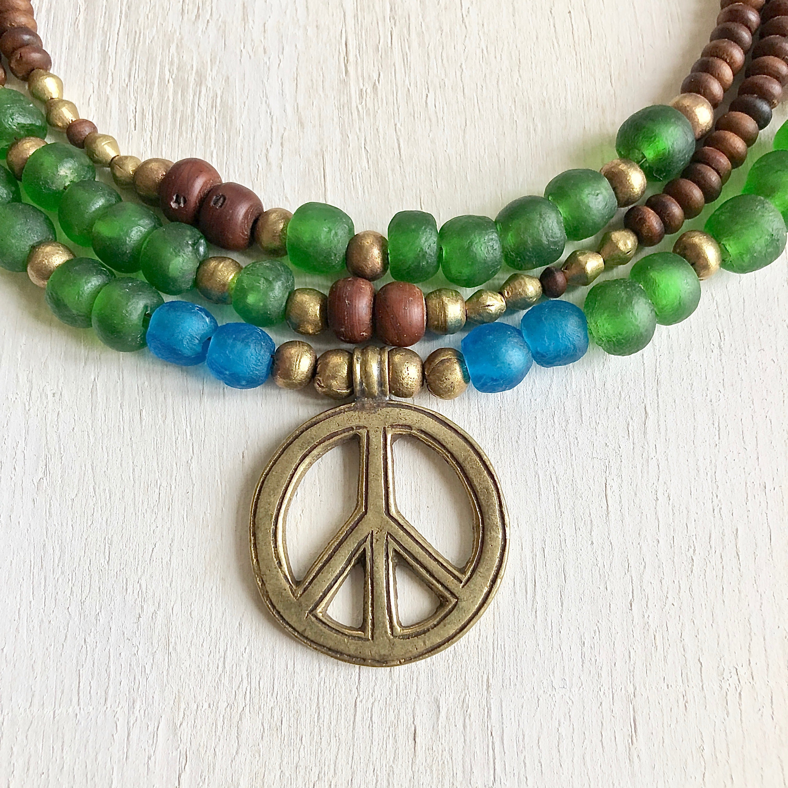 African recycled bottle beads peace necklace. Cristina Tamames Jewelry Designer