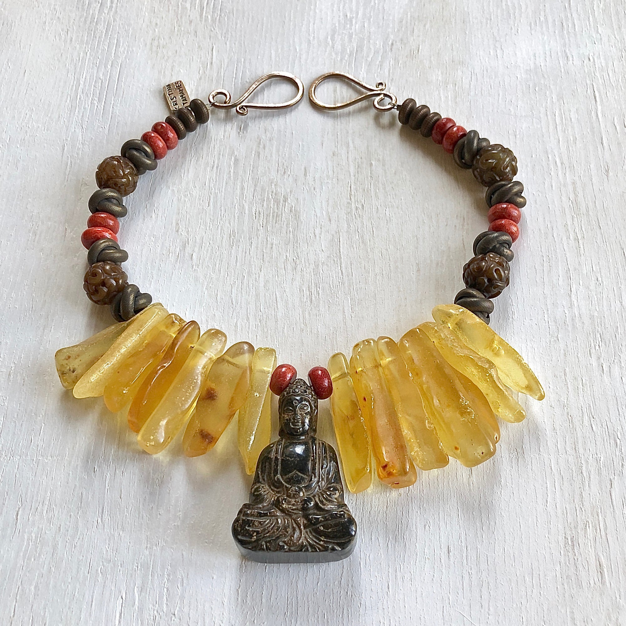 Amber coral jade Buddha necklace. Cristina Tamames Jewelry Designer