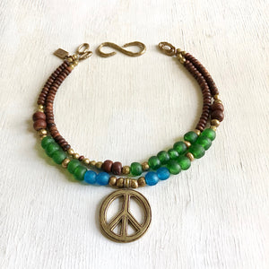 African recycled bottle beads peace necklace. Cristina Tamames Jewelry Designer
